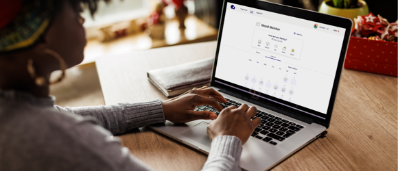 patient on her laptop talking to a provider