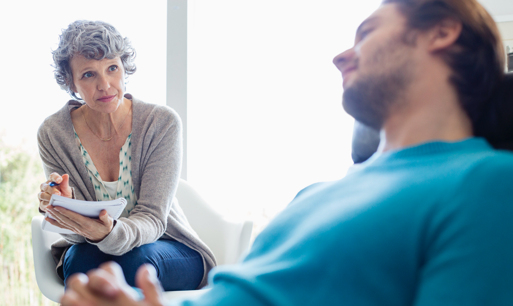 patient talking to a therapist